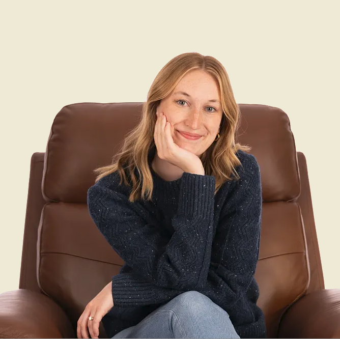 man in recliner reading paper