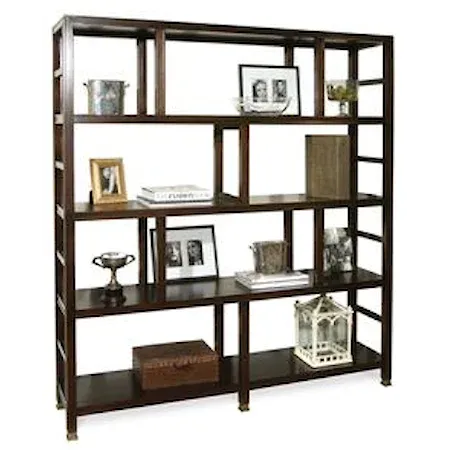 large bookshelf with photos and trophies