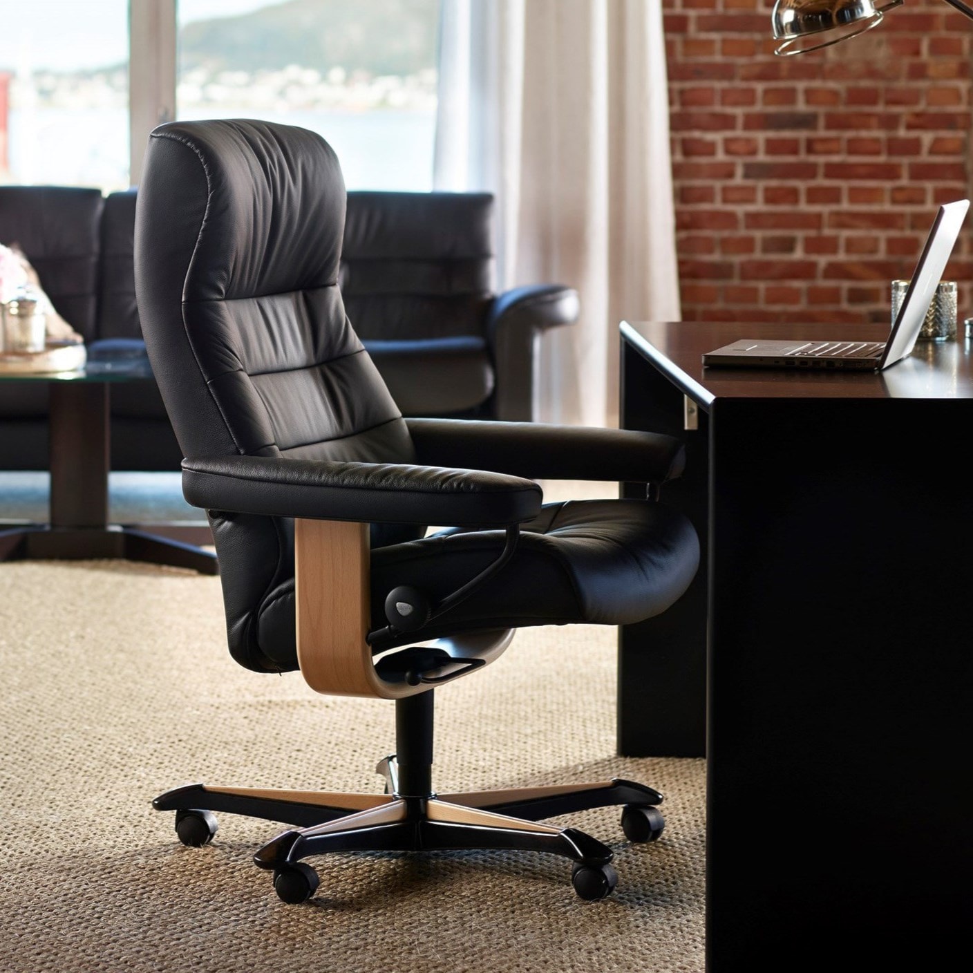 black office chair with wood accents