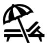An icon of a beach chair and umbrella.