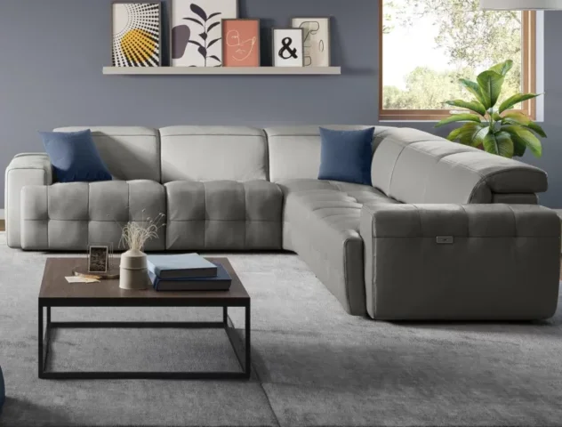 Gray sectional in neutral room.