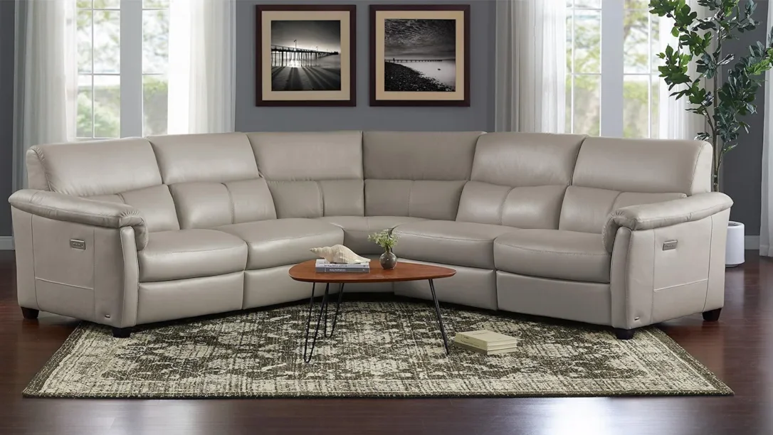 Neutral-colored reclining sectionals. 