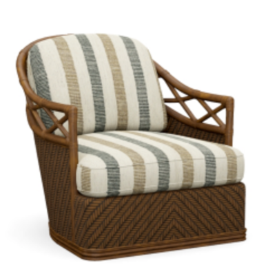 Wicker chair with striped cushions. 