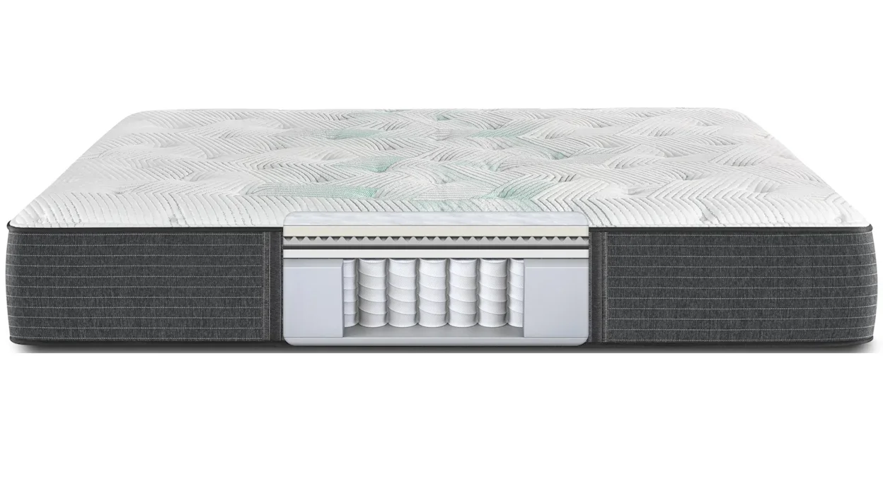 Front view of a mattress with cutaway view to show layers. 