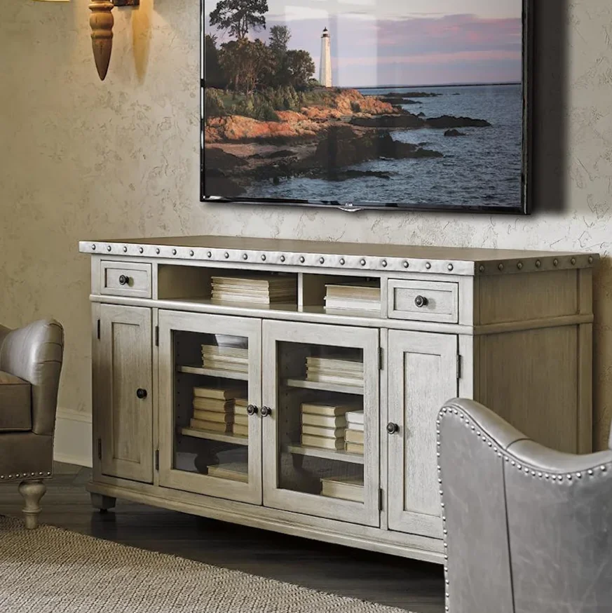 Industrial style media console filled with books. 