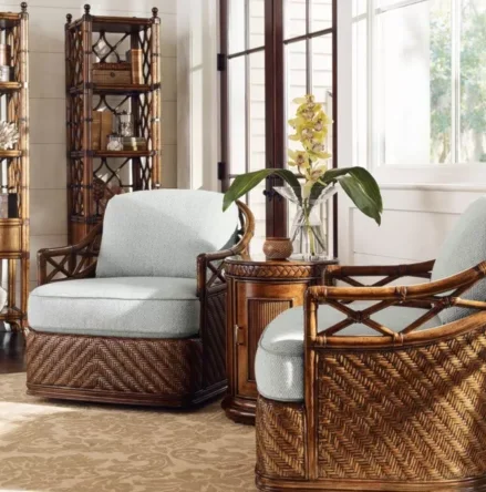 Beautiful rattan easy chairs with light-blue fabric cushions. 