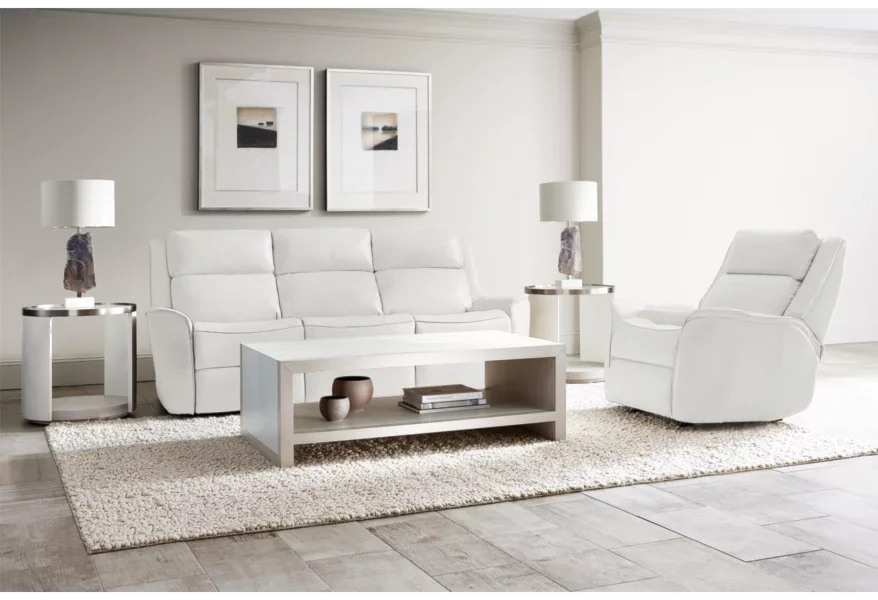 White leather reclining sofa in a contemporary living room setting. 