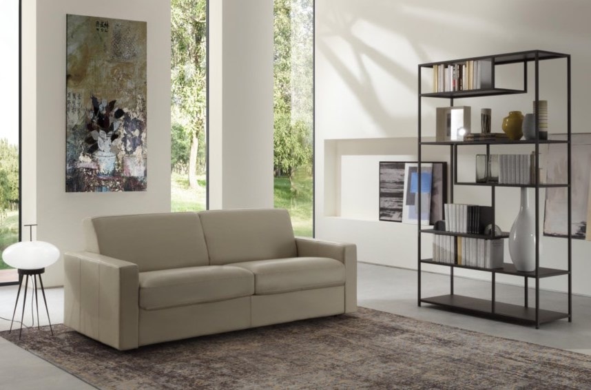 Minimalist interior with an elegant leather sofa. 