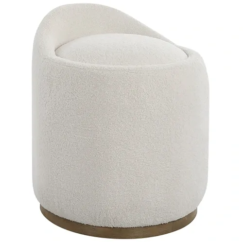 white upholstered round ottoman