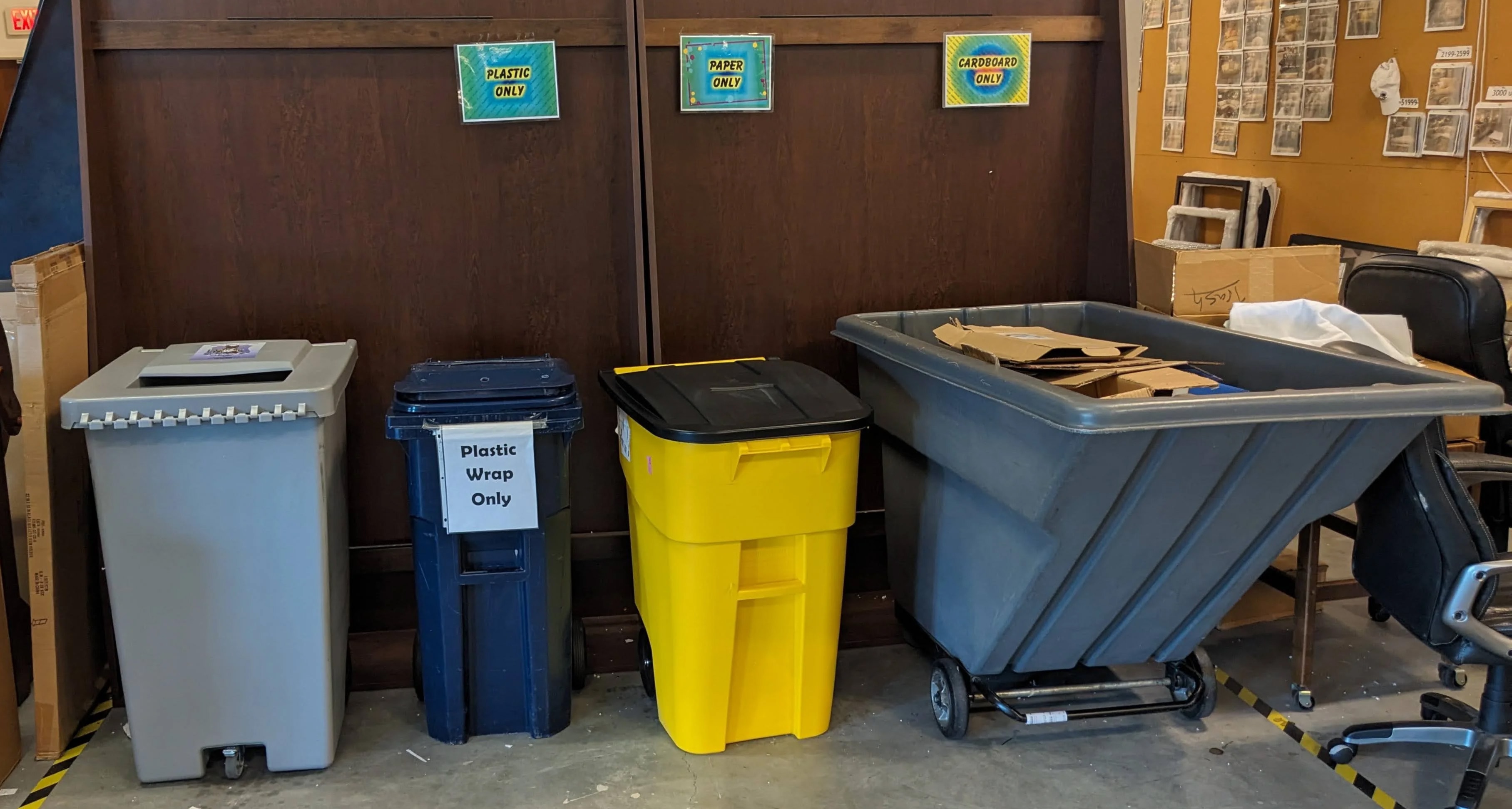 a picture of one of our recycling locations showing the various bins for various materials