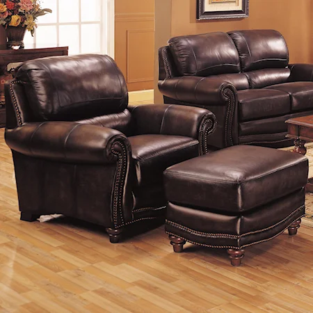 Leather Upholstered Chair and Ottoman with Nail Head Trim