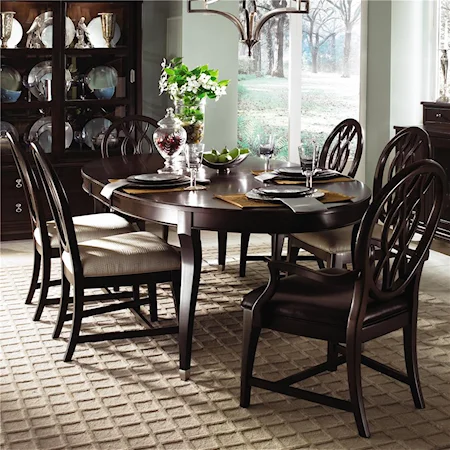 Oval Leg Table, Leather Arm Chairs, and Fabric Side Chairs