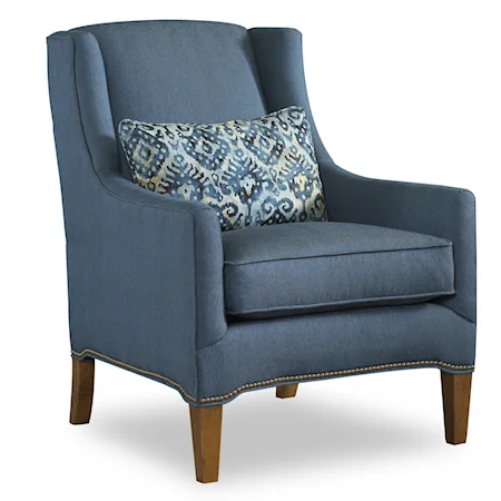 Transitional Wing Chair with Exposed Wood Feet and Nailhead Trim